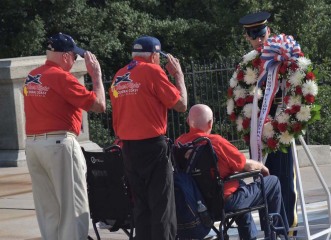 Veterans laying a wreath at the Tomb of the Unknown Soldier