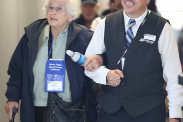 Veteran escorted by American Airlines employee