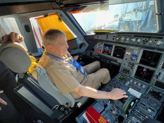 Veteran in the cockpit of an airplane